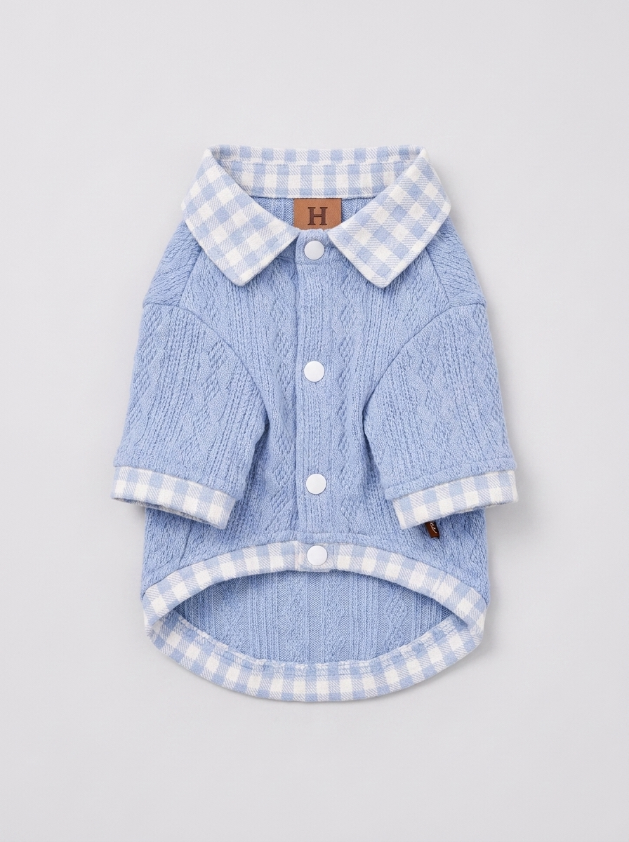 detail — cable-knit texture and gingham collar