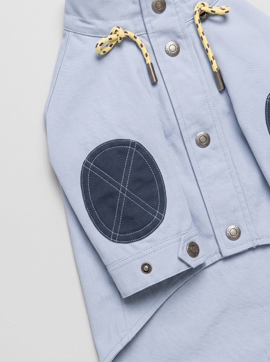 detail — drawstring toggles and elbow patches