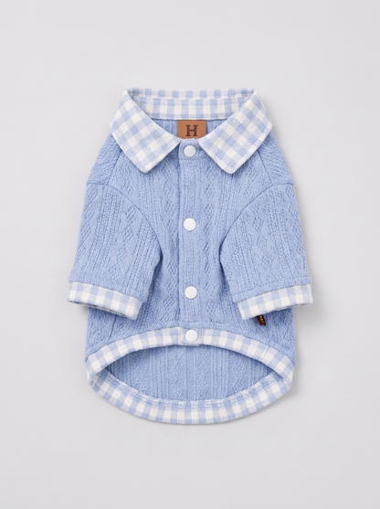 detail — cable-knit texture and gingham collar