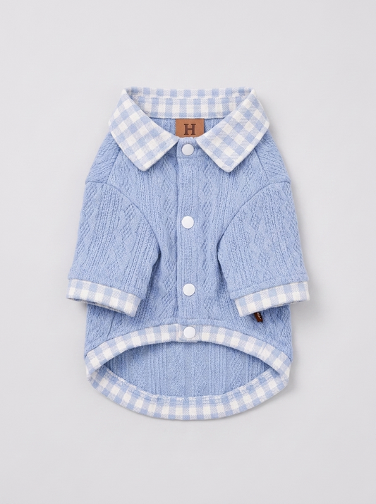 detail — cable-knit texture and gingham collar
